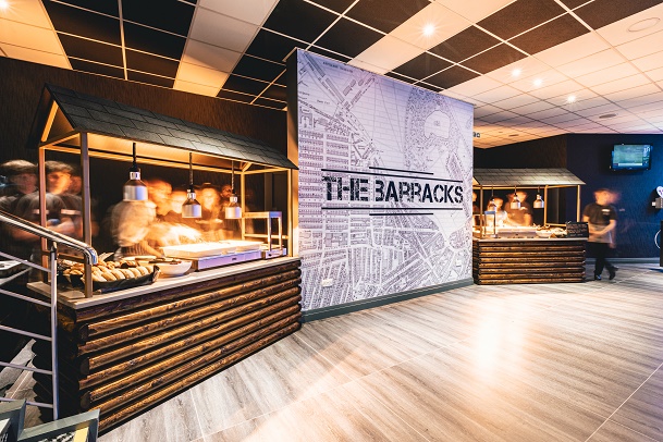 WE ARE PROUD TO UNVEIL THE BARRACKS FOR THE 2019/20 SEASON.Our new contemporary hospitality area, situated on Level 4 of the Milburn Stand, gives fans the opportunity to enjoy a light bite before watching the match from brilliantly situated seats.The Barracks package includes:Premium Milburn Level 4 seatingDeli Sandwich & side dish food offerLive entertainment pre and post-match (music and guest speaker insights)Matchday programmeLimited Edition badgesMatchday souvenir badgeSpeciality drinks options and offersThe Barracks opens 90 minutes before kick-off and closes 2 ½ hours after the final whistle.